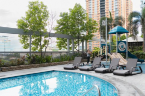 Cubao Manhattan Heights Residential Condo TA4N - Low Floor Studio with Pool & Balcony, 5 Mins Walk to Gateway Mall & Araneta Coliseum LRT MRT Cubao Quezon City - Staycations by SMS
